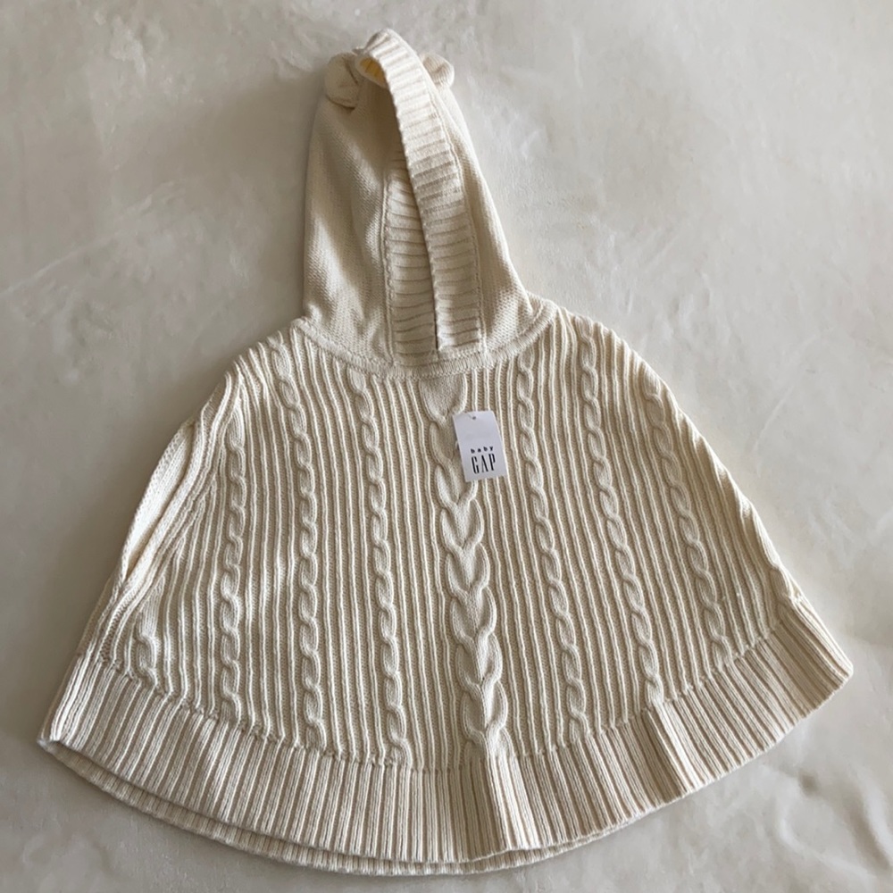 NWT cream colored baby Gap poncho.